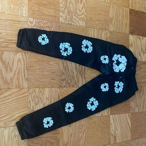 I am selling a pair of denim tear sweat pants.